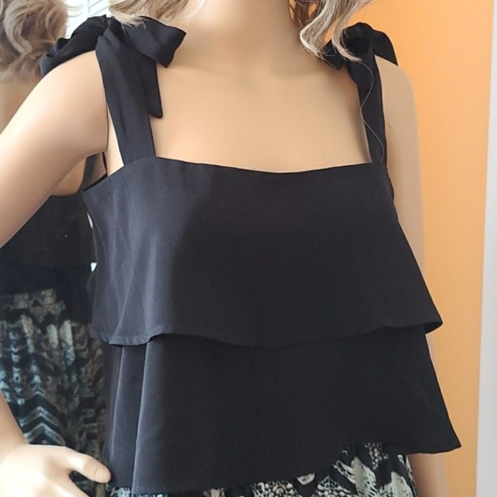 Tobi black tank size small never worn. Great condition!